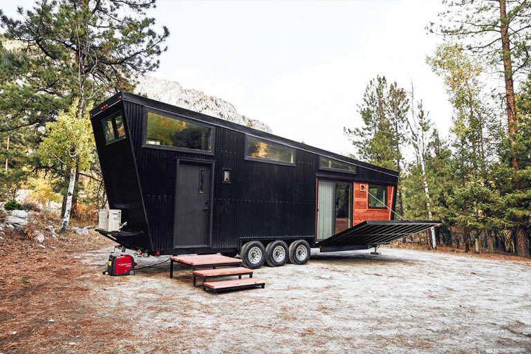 This Land Ark Tiny House RV is perfect for individual or a coupl