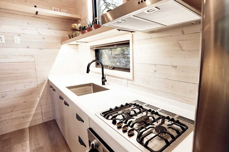 This Land Ark Tiny House RV is perfect for individual or a coupl