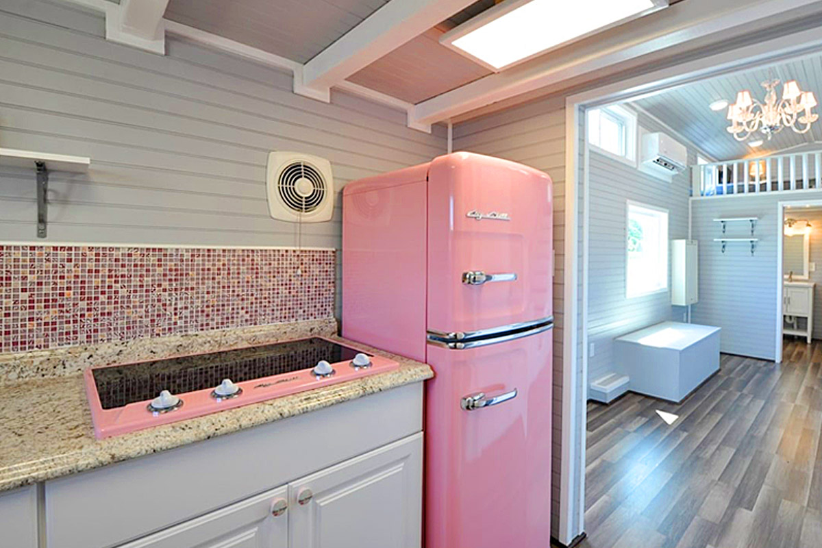 Tiny Home With Retro Style Pink kitchen appliances