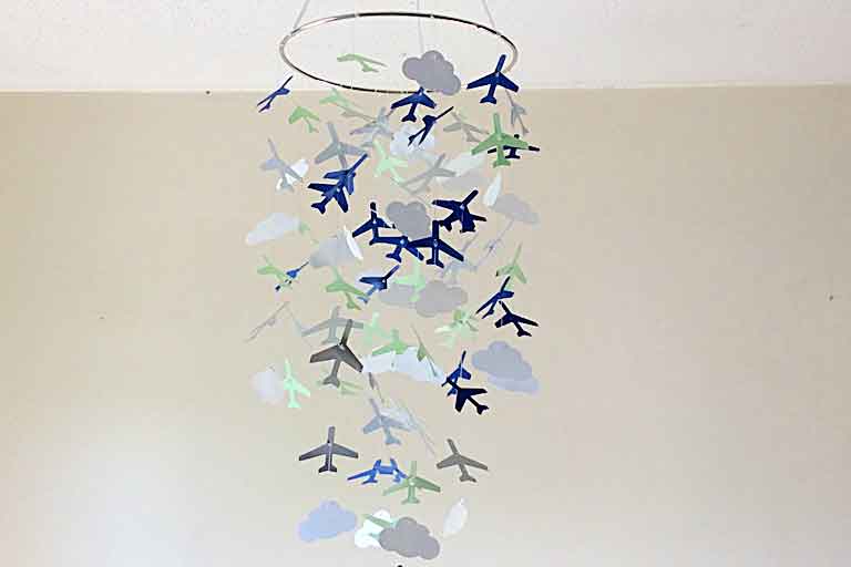 Airplane and clouds paper hanging