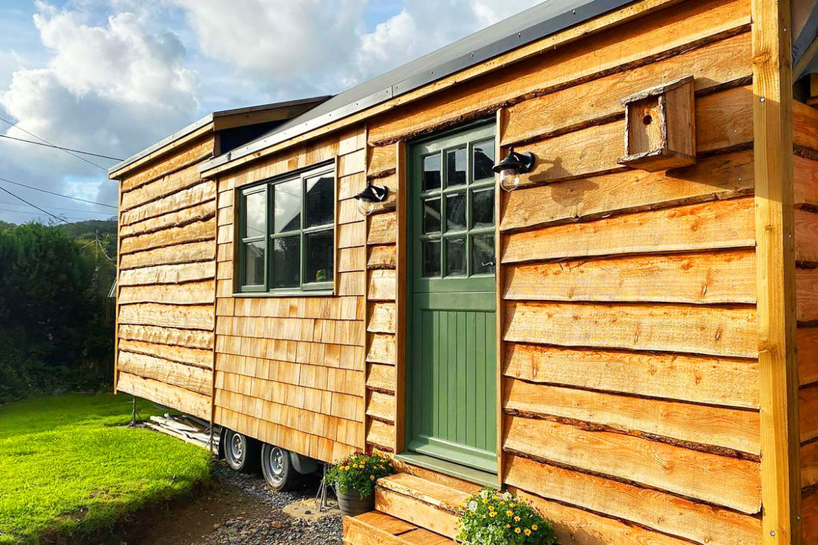 Dion & Ben Go from Van-Life To a Traditional Wood Cabin Style Tiny House!