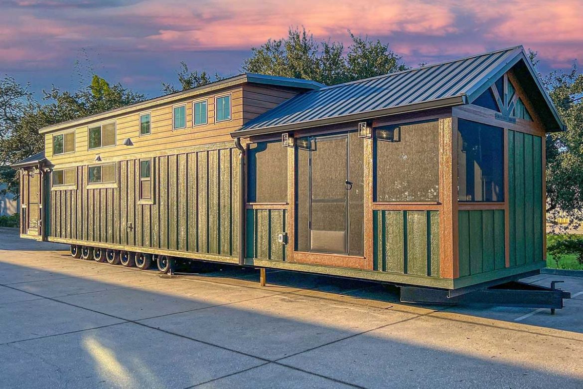 595 sq ft Park Model tiny house with enclosed front & back porch