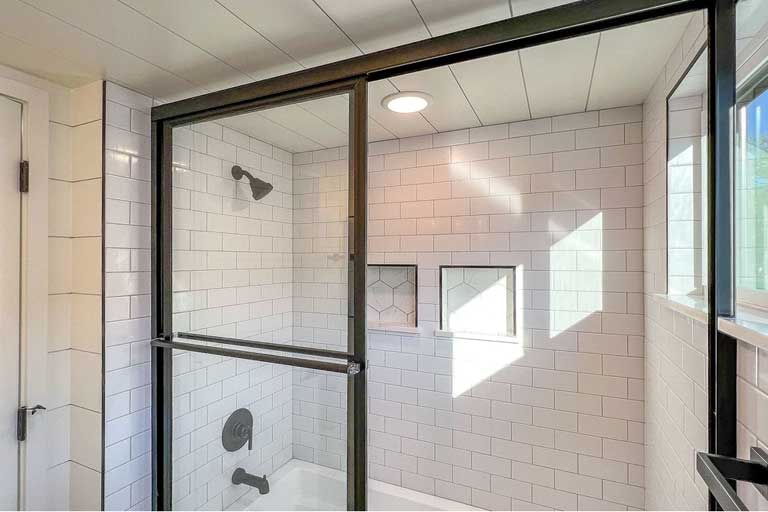 bathtub with glass door