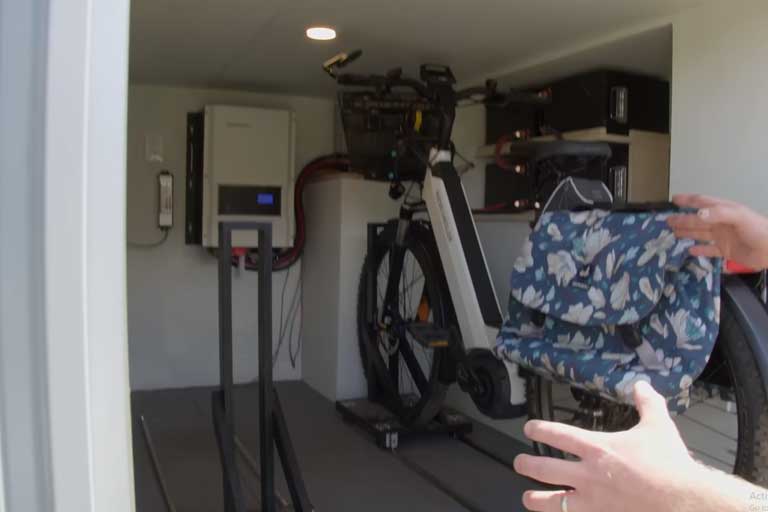 Macdonald: A 32 ft gooseneck trailer tiny house with e-bike garage