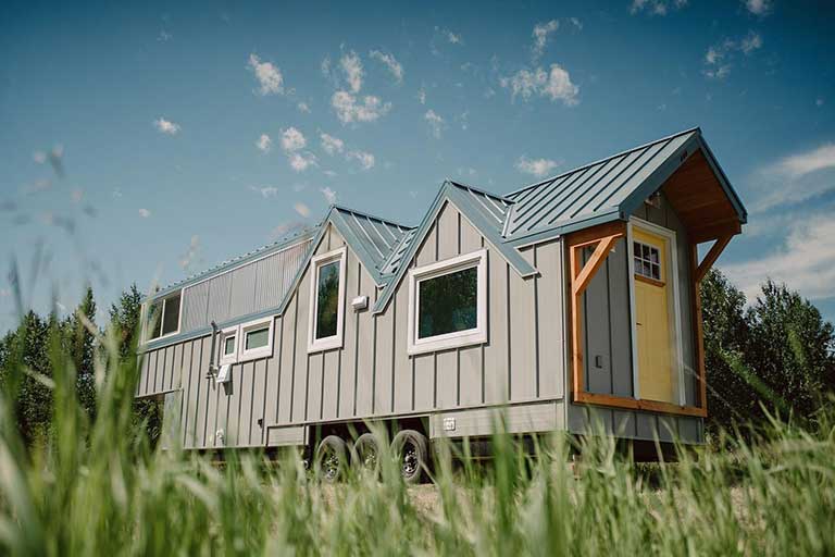 Macdonald: A 32 ft gooseneck trailer tiny house with e-bike garage