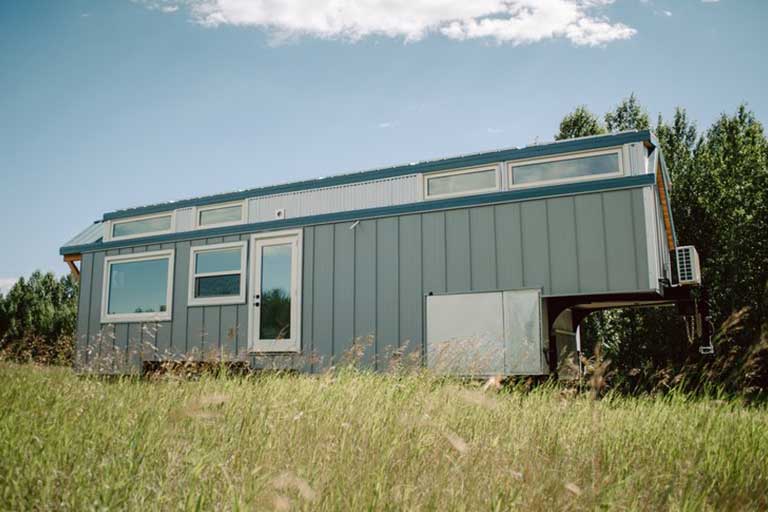 Macdonald: A 32 ft gooseneck trailer tiny house with e-bike garage