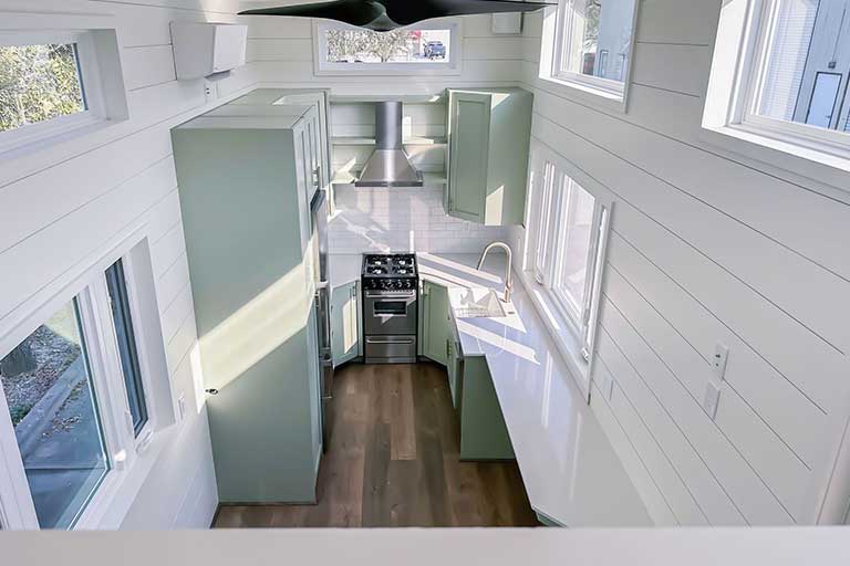 The Heese tiny house on wheels with clean interior color for functional living