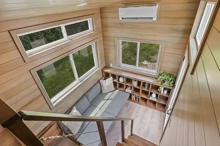 Rustic wood finishes and cozy seating in the Mocha’s living area.