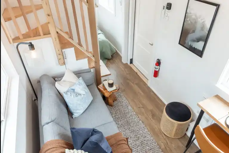 Vaulted ceilings in the living area make the space feel open and airy.