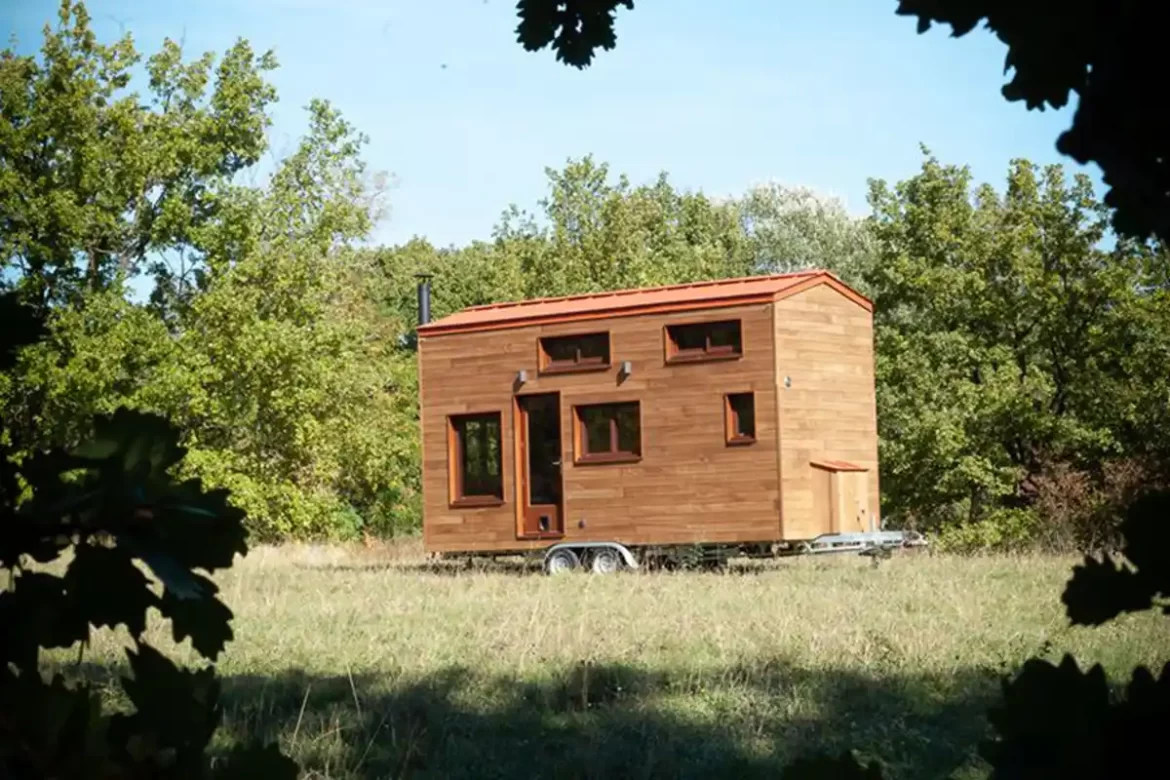 Cosmos tiny house exterior with French poplar cladding and aluminum roofing.