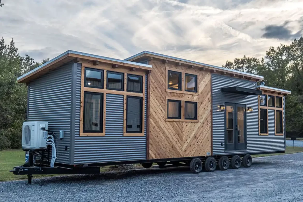 The Big Sky tiny house by Timbercraft Tiny Homes, featuring western cedar and metal siding.