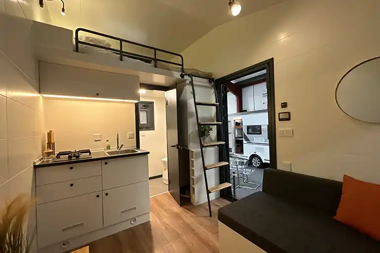 Well-equipped kitchen featuring a two-burner gas hob and sink.