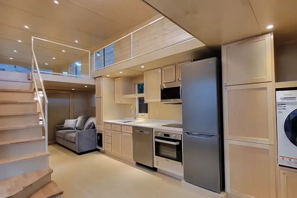 A full-size kitchen with premium appliances and built-in laundry center.