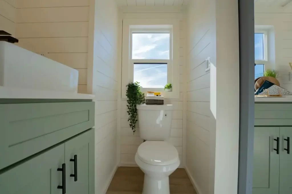 Modern bathroom with 36-inch shower and flush toilet.